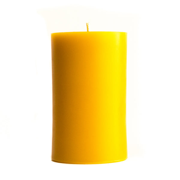 3" by 5" beeswax pillar candle on a white background